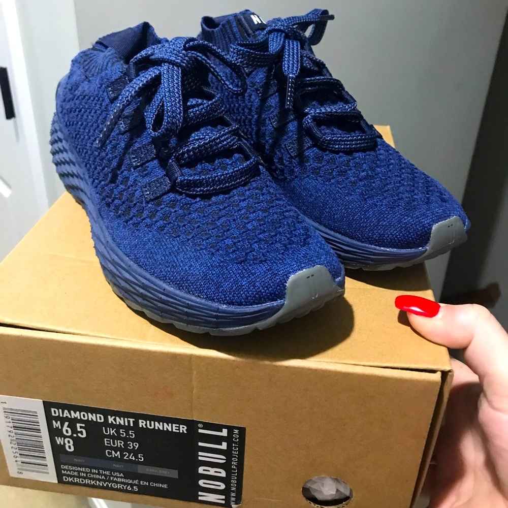 New in box never worn (bought a size too big!); no bull running sneakers;size 8